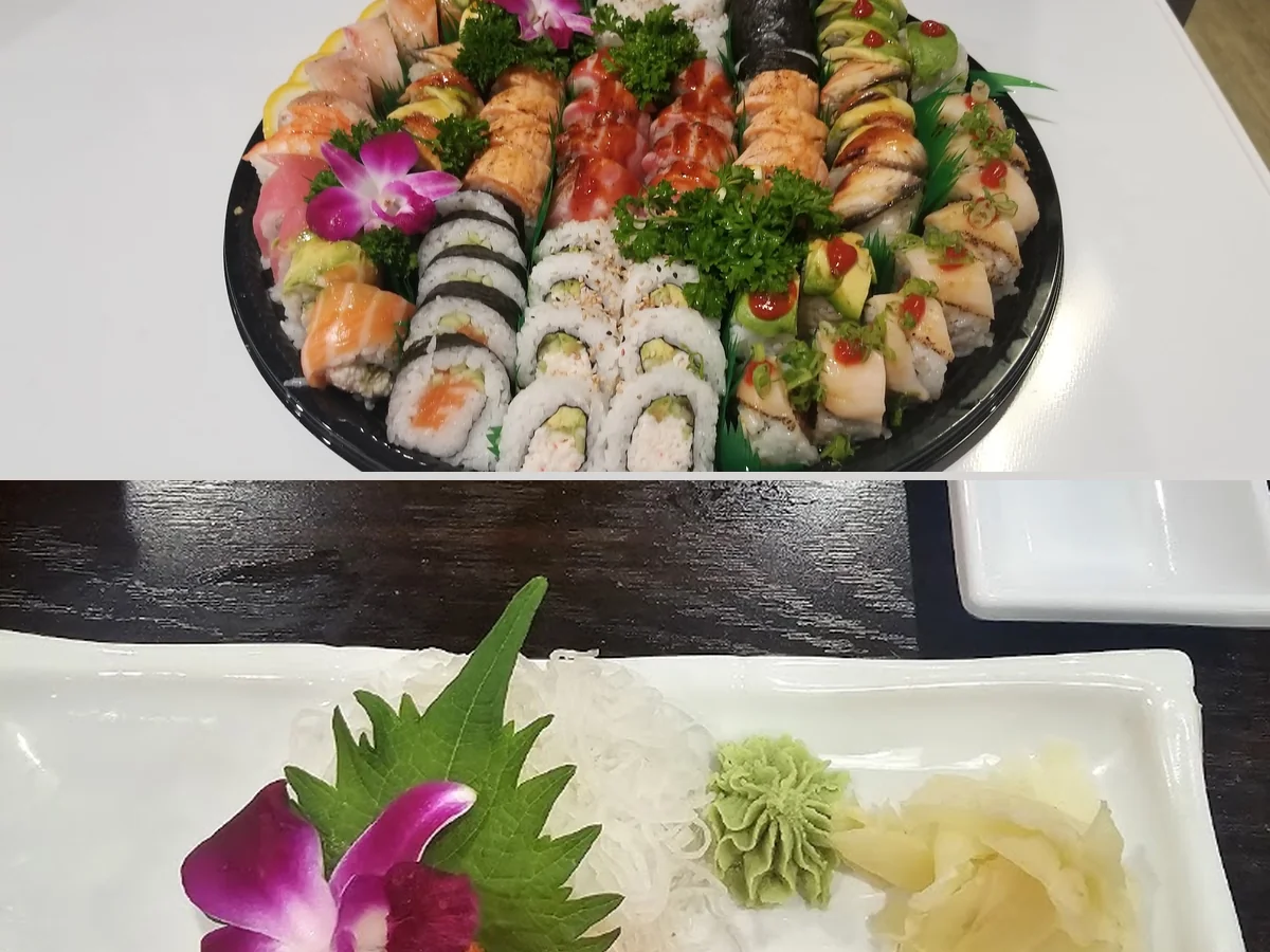 A sushi restaurant dining table with shared plates.