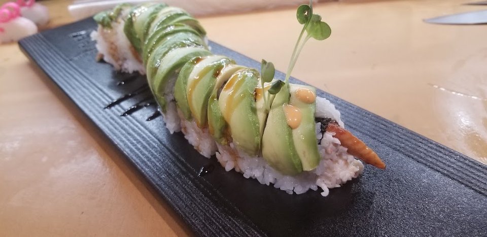 Printed sushi menu with lunch specials.